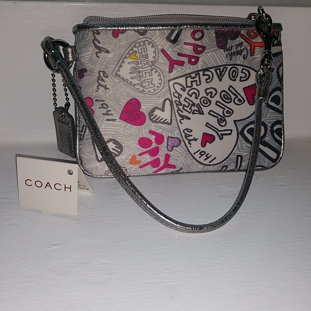 New with Tags - Coach wristlet Silver Poppy